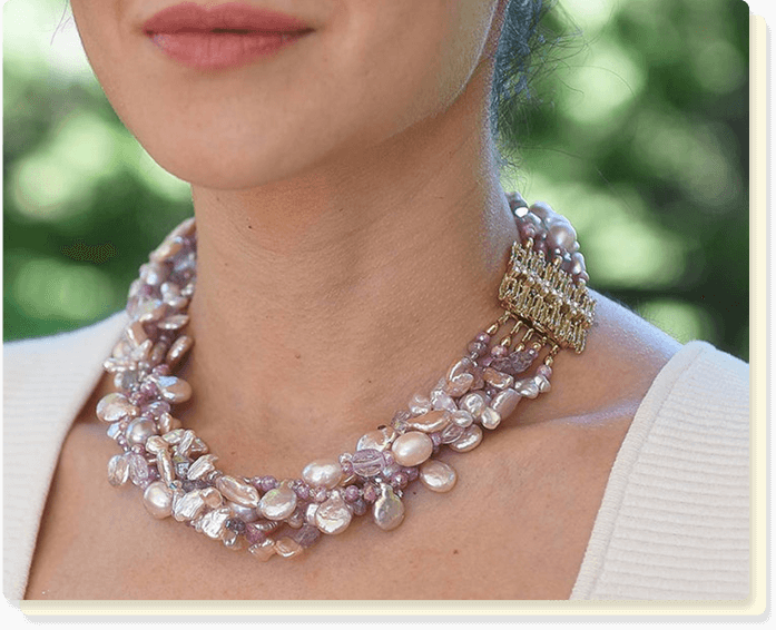 A Woman Wearing A Pearl Necklace